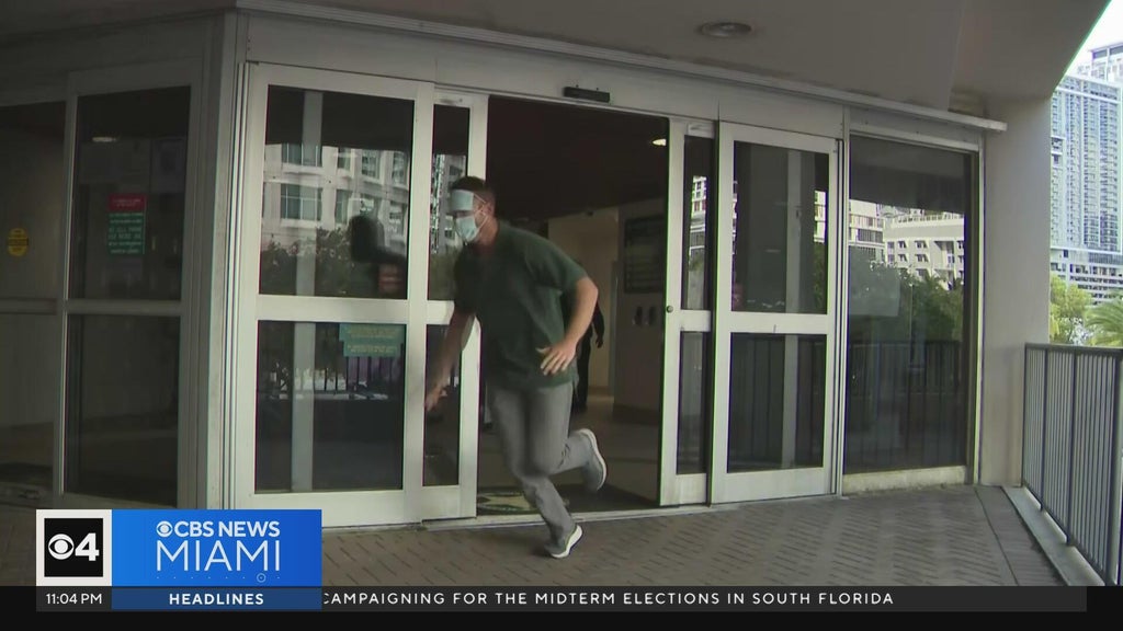 Ex-Lauderhill cop arrested for impersonating dead man runs away from cameras after release — CBS Miami, Key Biscayne Community news
