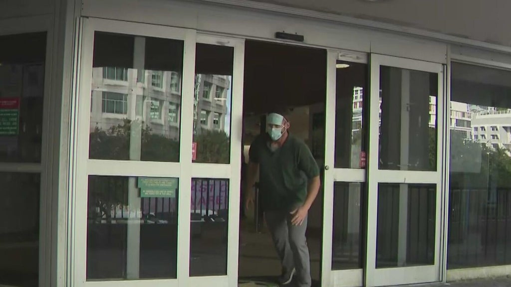 Suspended Broward officer runs out of jail after arrest for alleged identity theft on dead man — CBS Miami, Key Biscayne Community news