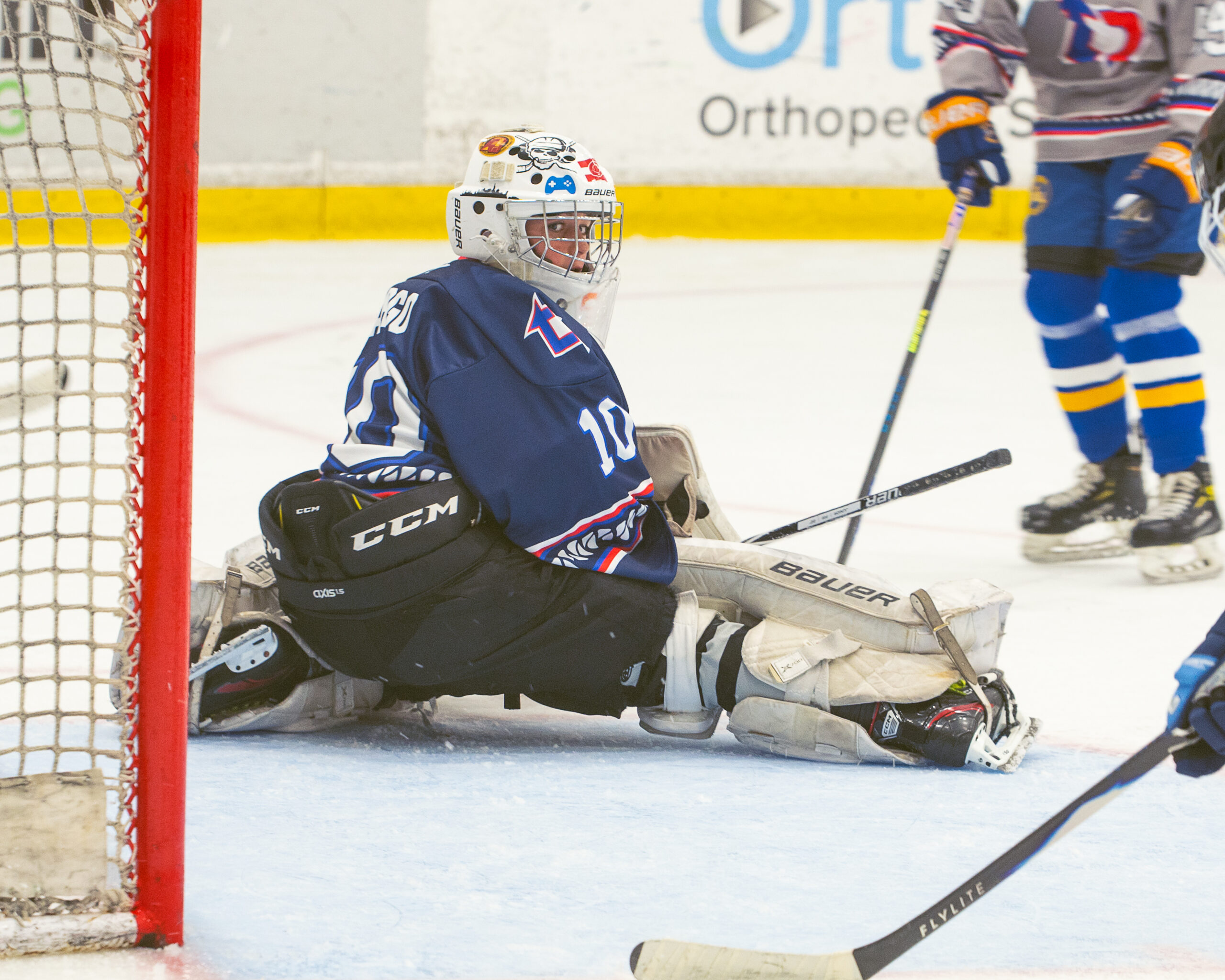 Helping through hockey — Florida Weekly